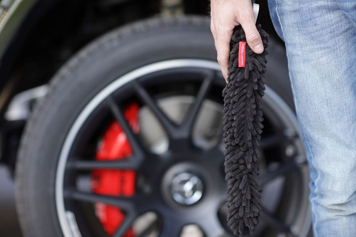 Image of Woolly Wormit in front of a wheel